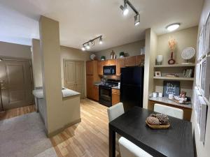 Two Bedroom Apartments in San Antonio, Texas - Model Dining Room with View to Kitchen